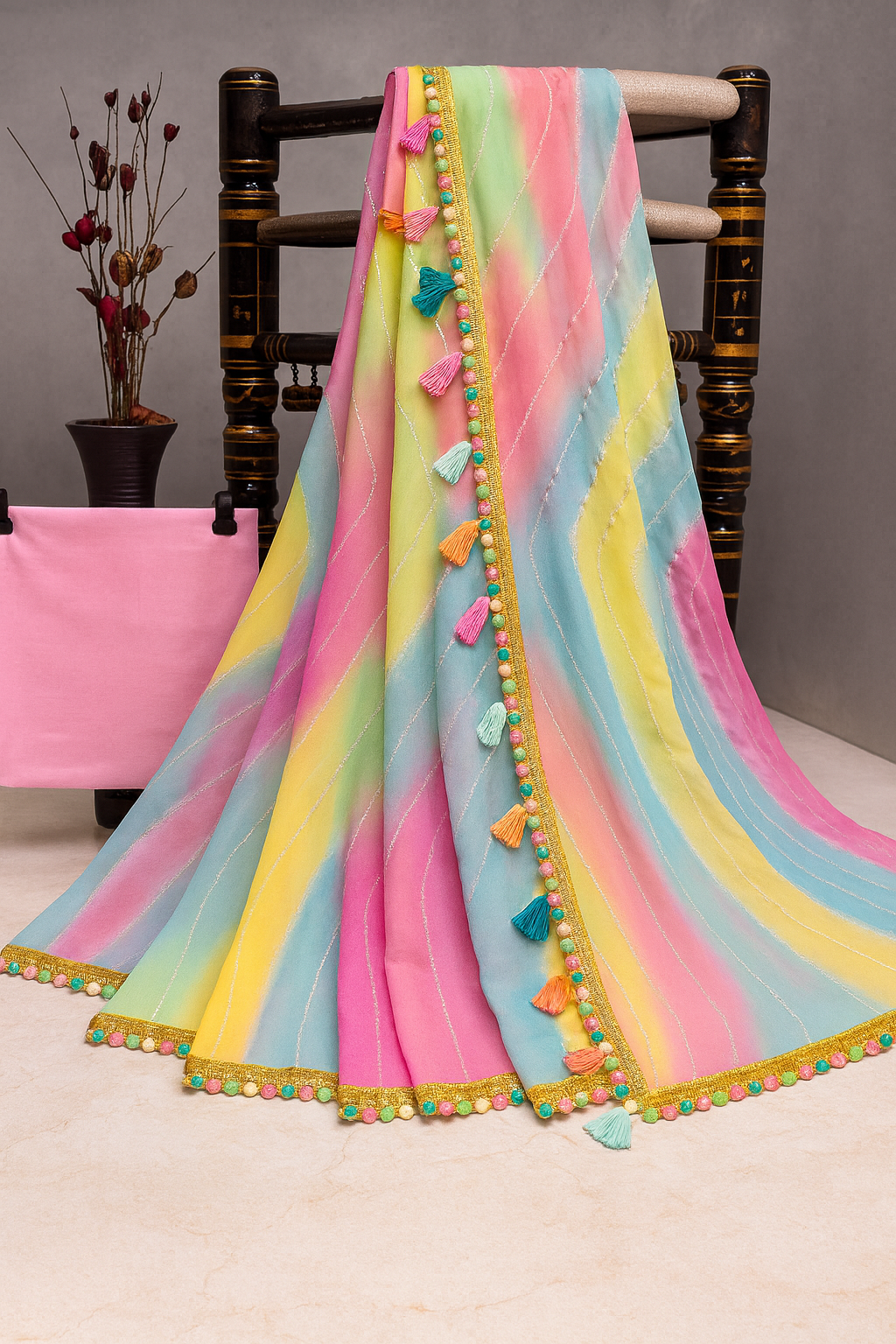 Glow in Grace – Rainbow Tassel Party Wear Georgette Saree